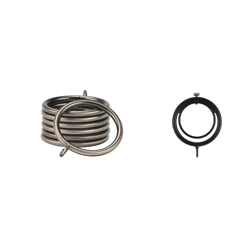 Kirsch Designer Metals drapery hardware display showcasing standard eyelet rings and functional ring locks, available in both 1-inch and 1 3/8-inch diameters across eight premium metallic finishes 